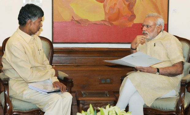 Prime Minister Narendra Modi with Andhra Pradesh Chief Minister N Chandrababu Naidu at a meeting in New Delhi (Photo: PTI) Prime Minister Narendra Modi with Andhra Pradesh Chief Minister N Chandrababu Naidu at a meeting in New Delhi (Photo: PTI)
